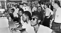 The four men at this 1960s Mississipi lunch counter will be arrested. 